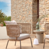Fauteuil Nadin en corde beige et pieds en acier
